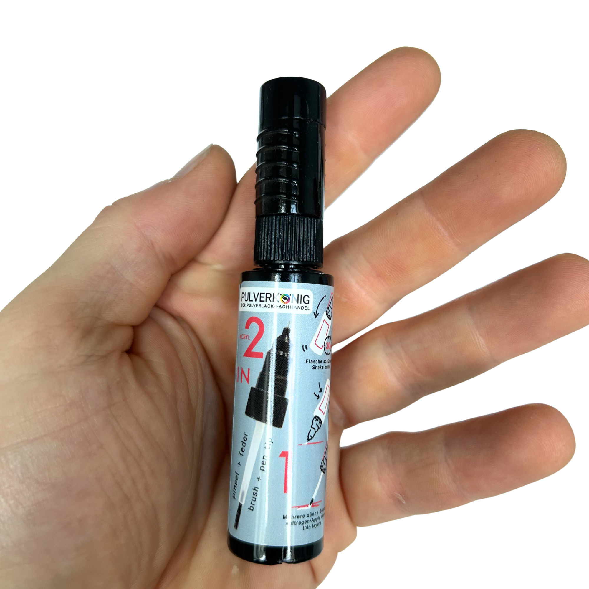Lackstift RAL 9005 Tiefschwarz in der Hand, Größenvergleich